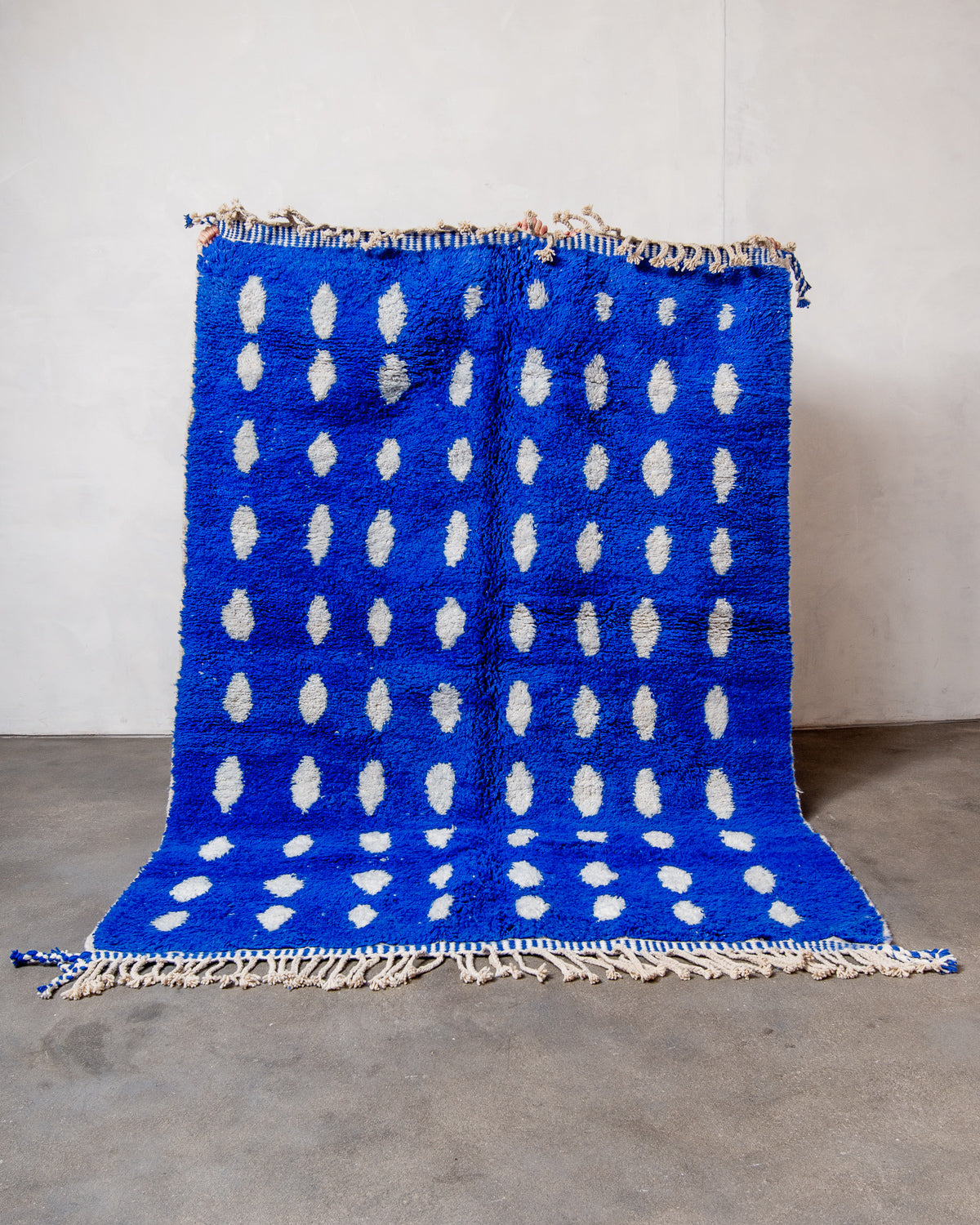 Modern, designer, handcrafted Berber rug from Morocco. Beniourain carpet with beautiful colours and patterns and fluffy wool texture.